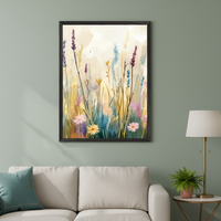 Living room with a light beige sofa. A large framed abstract watercolor painting of a field of wild flowers, including lavender and daisies, hangs centrally above the sofa. A side table with a lamp and plant is to the right.