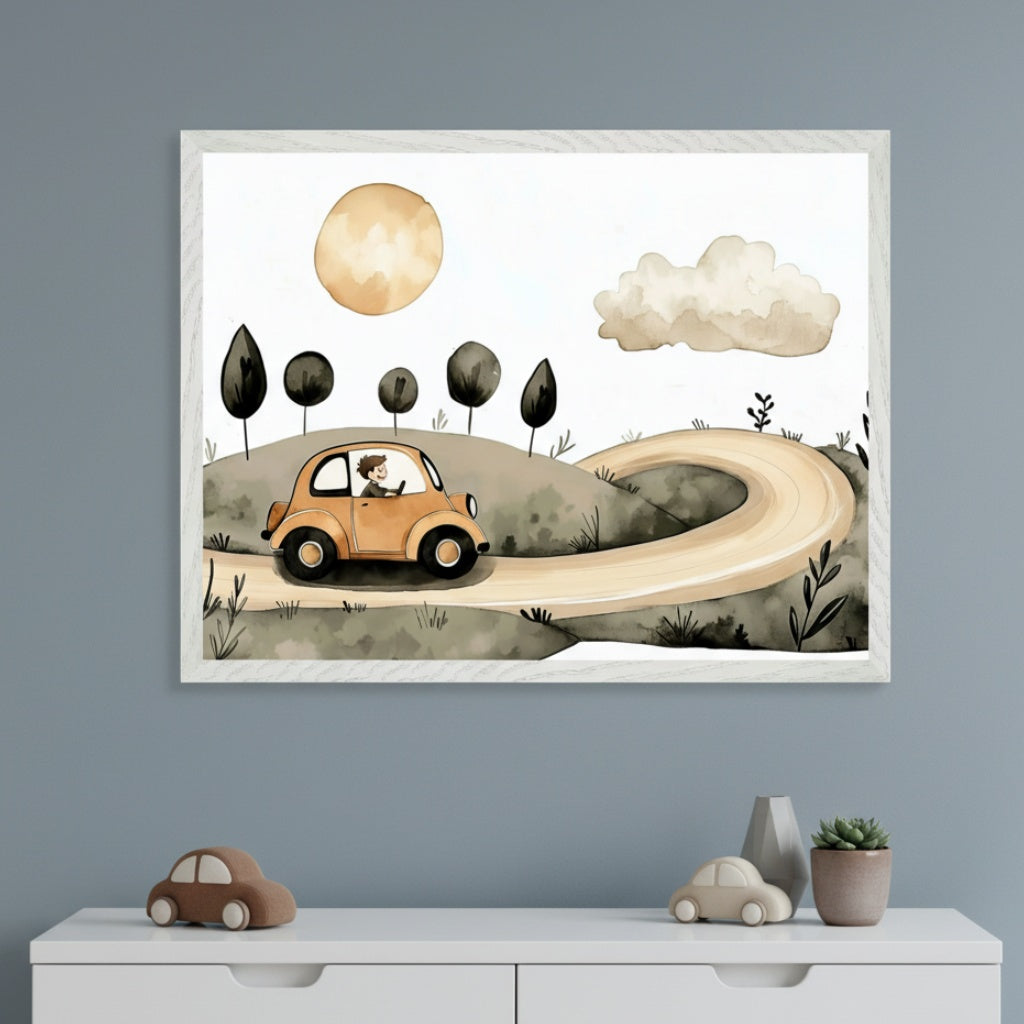 Kid's room with a white dresser against a blue wall. A framed watercolor art print of a boy driving an orange car on a winding road through hills with trees, a sun, and a cloud hangs centered above the dresser. Decorative toy cars and a plant are on the dresser.