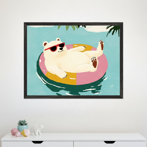 Modern nursery with a white dresser. A large framed illustration of a cartoon polar bear with red sunglasses floating on a pink and yellow ring in blue water hangs above the dresser.