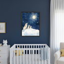 Modern nursery with a white crib and partially visible white dresser against a dark blue wall. A framed watercolor print of a wolf family howling at the moon and stars hangs above the crib.