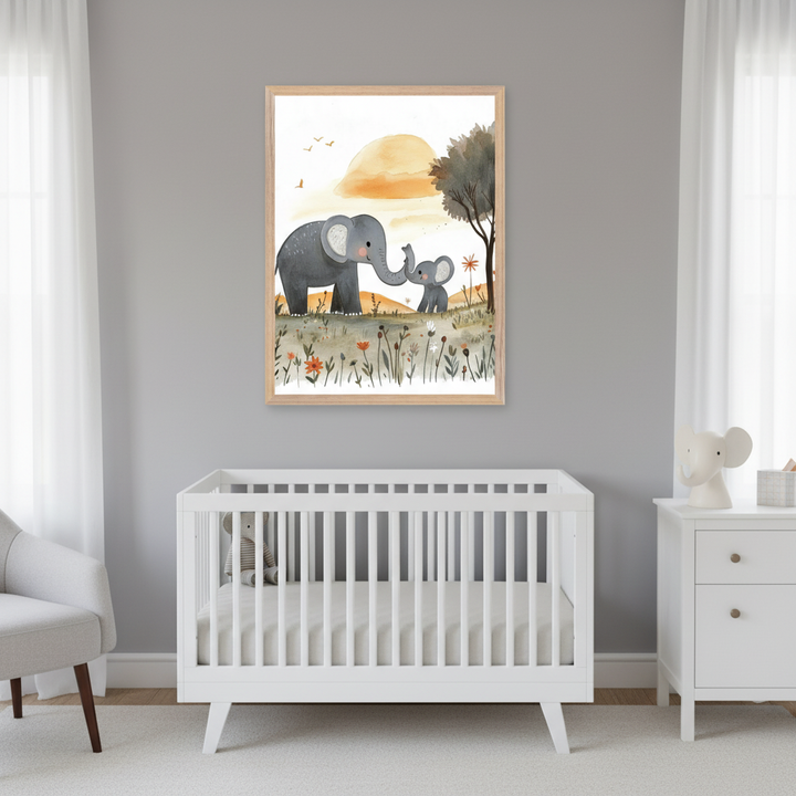 Modern nursery with a white crib and light gray armchair. A framed watercolor print of a mother and baby elephant in a field at sunset hangs centered above the crib. A white dresser is on the right.
