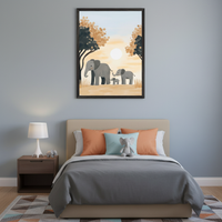 Kid's bedroom with a beige upholstered bed, gray duvet, coral and blue pillows. A dark brown nightstand on the left holds a white lamp. Above the bed, a large framed print shows three gray elephants walking right in a savanna at sunset with trees, in an illustrative style.
