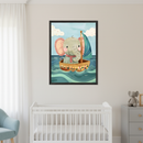 Modern nursery with a white crib, light blue armchair, and a grey dresser. A framed watercolor-style illustration of a cute elephant sailing in a boat on wavy water hangs centered above the crib.