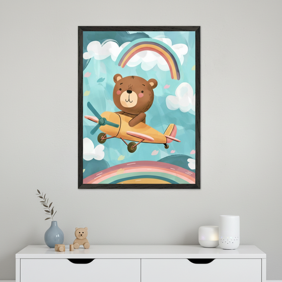 Child's room with a white dresser. A large black-framed watercolor illustration of a cartoon bear flying a yellow biplane amidst rainbows and clouds hangs above the dresser.