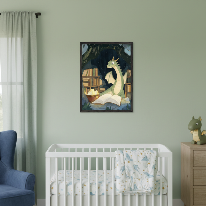 Nursery with light green walls, a white crib with dragon-patterned bedding, blue armchair, and wooden dresser. A framed illustration of a green dragon reading a book in a cave library with glowing eggs hangs above the crib.