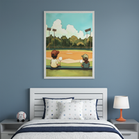 Kid's bedroom with blue walls, a white bed, and two nightstands. A framed cartoon-style print hangs above the bed, depicting two children eating cotton candy while watching a baseball field with trees and stadium lights. A baseball plush and an orange lamp are on the nightstands.
