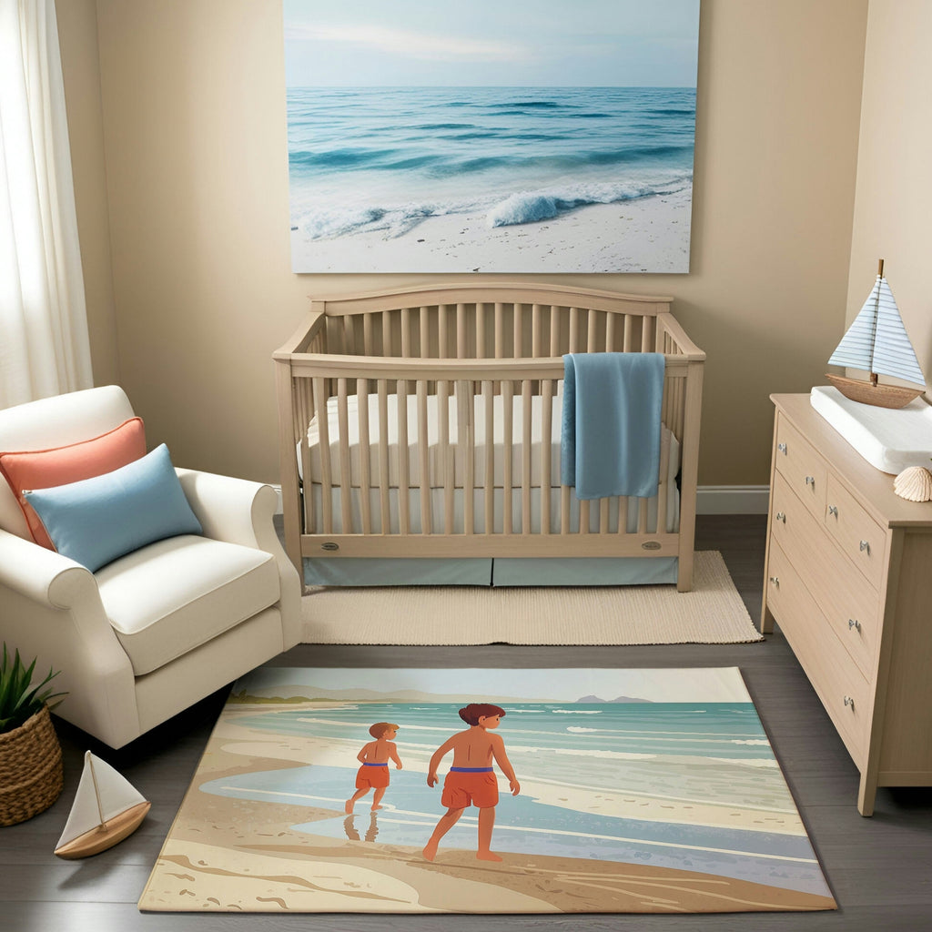 A serene beach-themed nursery featuring a light wood crib, a matching dresser with a changing pad, and a cozy white armchair with coral and blue pillows. The decor includes a large wall art depicting an ocean wave gently reaching the sandy shore and a small sailboat figurine. A vibrant area rug illustrates two children walking along a sandy beach with the ocean in the background, adding a playful yet tranquil coastal vibe to the room.