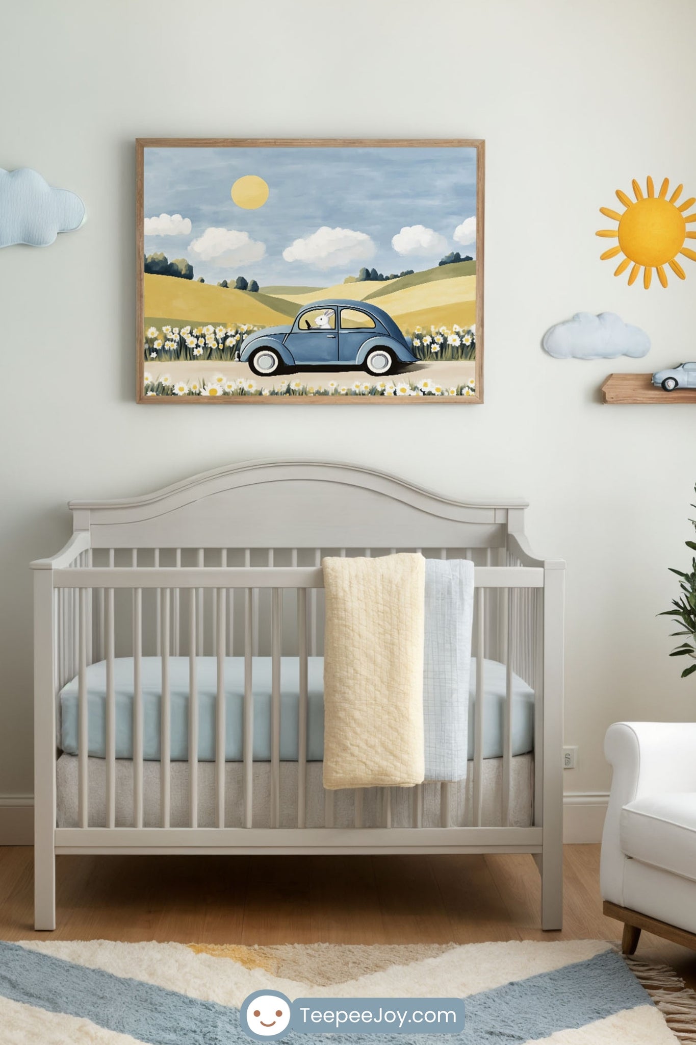 A bright and cheerful nursery featuring a white crib with soft blue and yellow bedding, a cozy cream armchair with a yellow pillow, and a wooden dresser. Above the crib hangs a framed digital painting of a white rabbit driving a vintage blue car through a countryside filled with daisies, rolling hills, and a sunny sky. The room is decorated with cloud and sun wall accents, a small floating shelf holding a toy car, and a plush geometric rug in shades of blue, yellow, and cream.