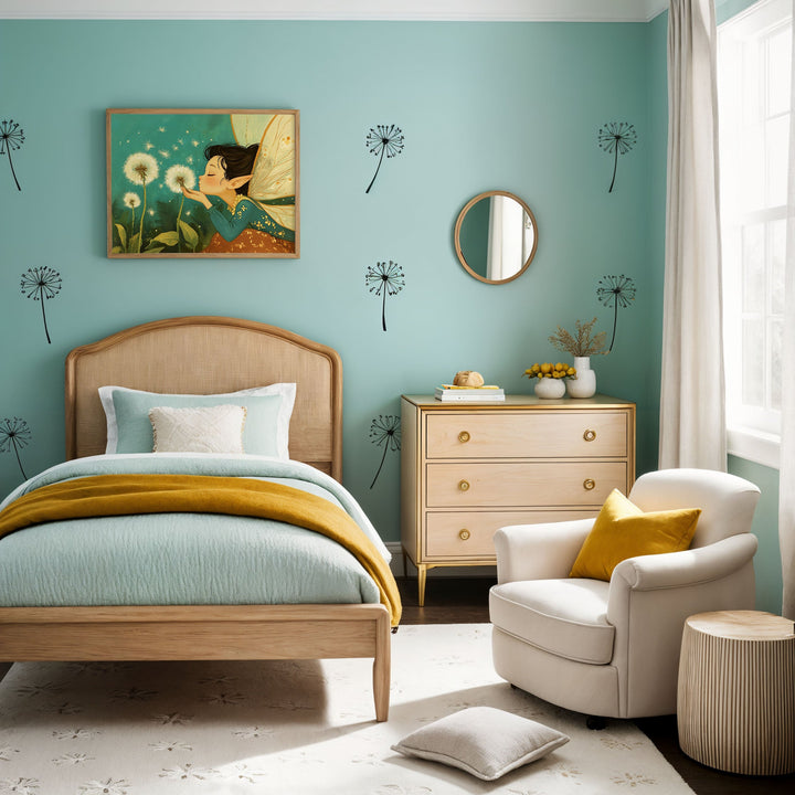 This image showcases a charming children's bedroom with a soft teal color palette and natural wood furniture. The room features a bed with a rattan headboard, a matching dresser, and a cozy armchair with a mustard-yellow pillow. Decorative elements include dandelion decals on the walls and a whimsical framed artwork of a fairy blowing dandelions, adding a magical touch to the space.