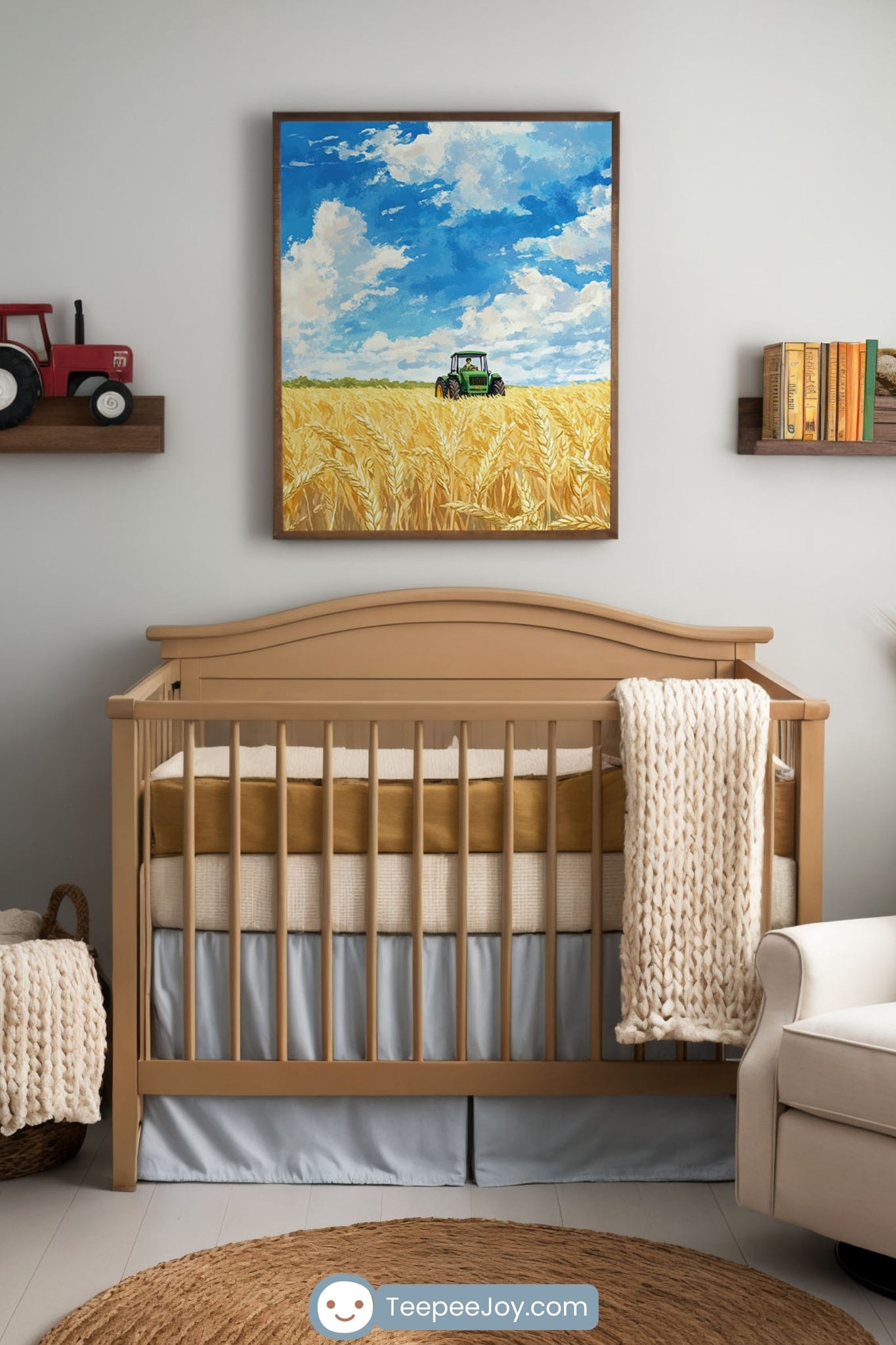 Cozy farm-themed nursery with a neutral color palette featuring warm wood tones and soft textiles. A wooden crib sits against a light gray wall, with a framed painting of a wheat field and green tractor hanging above it. Floating shelves hold a red toy tractor, books, and dried wheat accents, while a plush white armchair with a blue pillow and knit throw is positioned near a window with sheer curtains. A woven round rug and wicker baskets add rustic charm to the space.