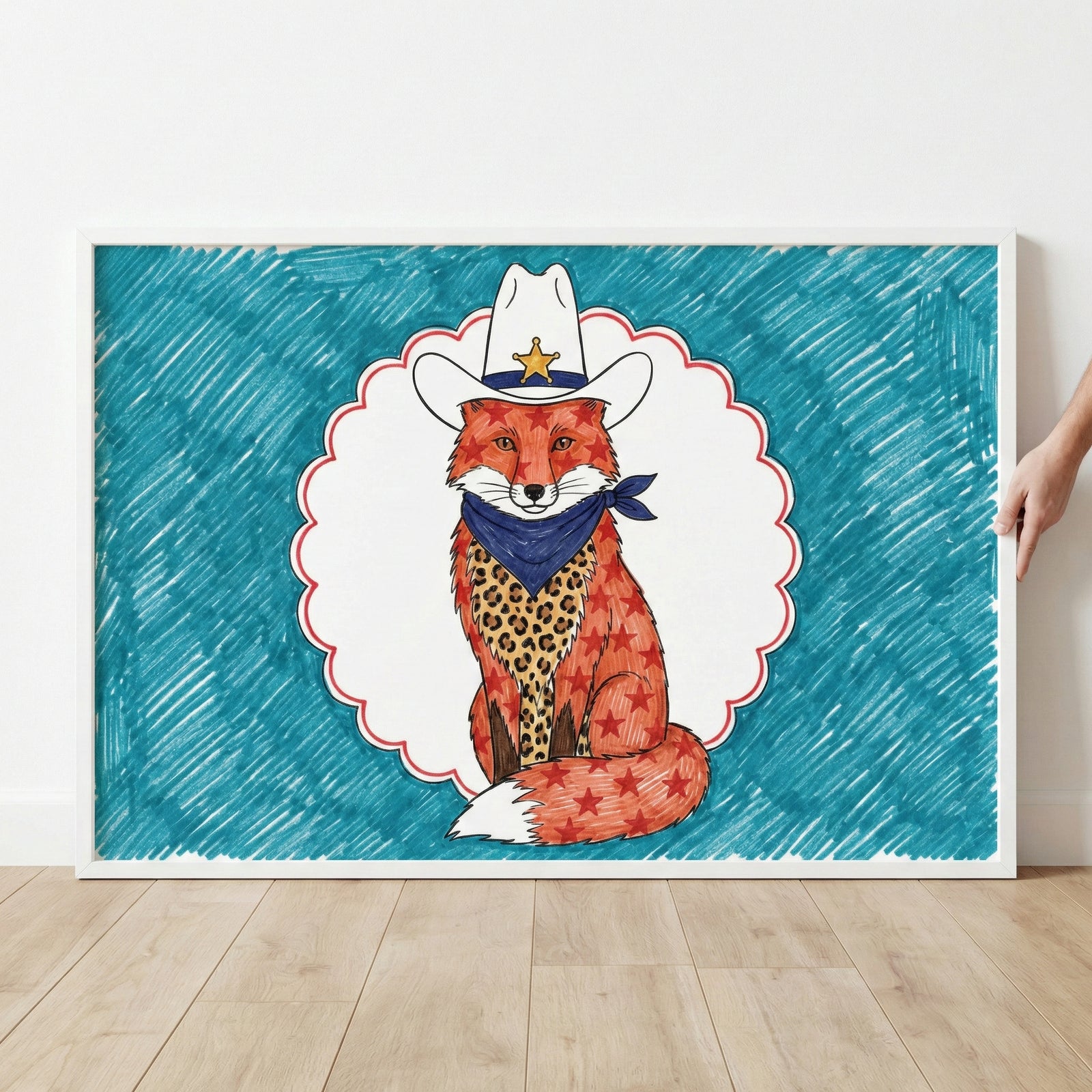 Framed western cowboy fox wall art in a white frame held by a hand against a white wall.