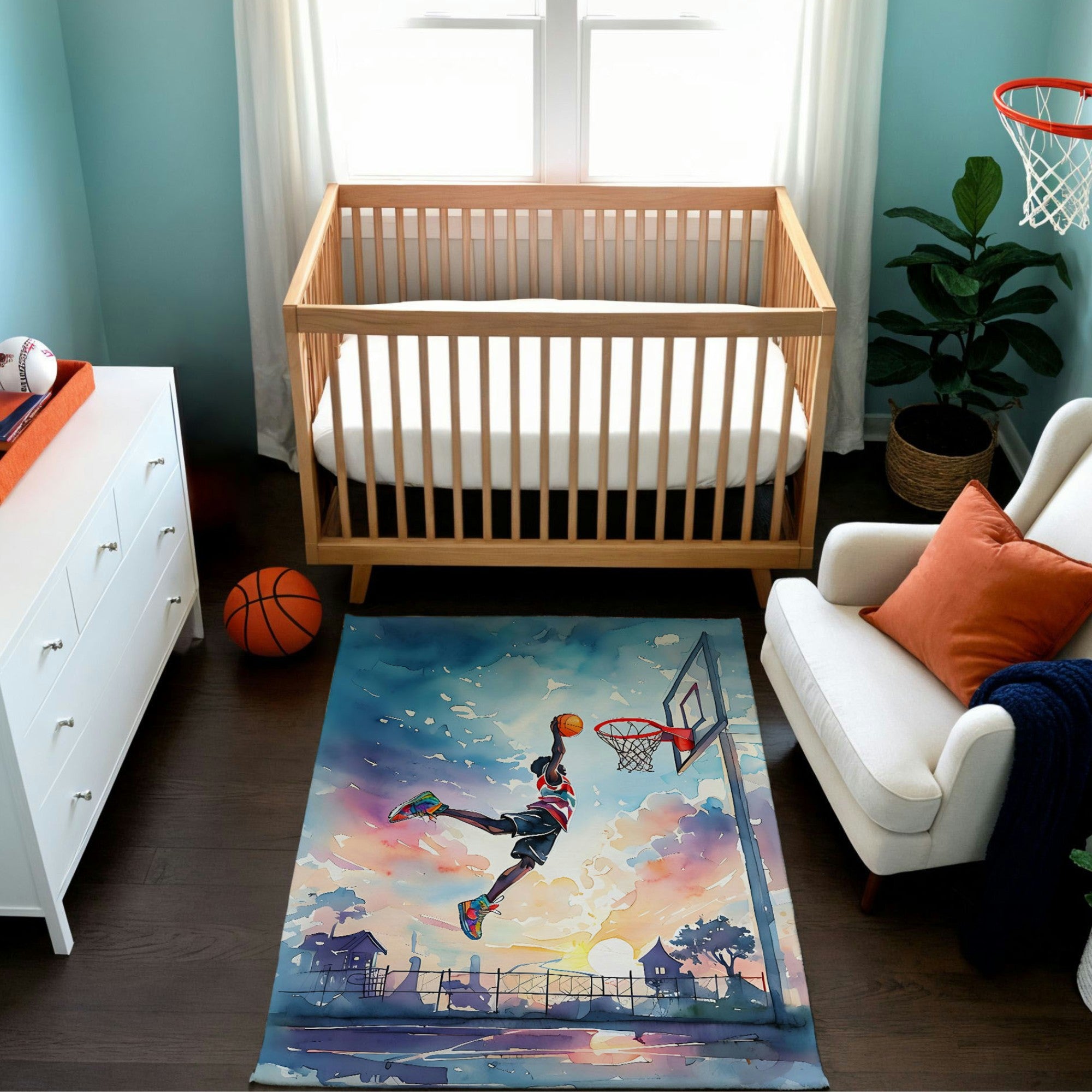 A sports-themed nursery featuring a wooden crib, a white dresser, and a cozy armchair with an orange pillow. The decor includes a basketball hoop mounted on the wall and a vibrant rug illustrating a basketball player mid-air dunking against a colorful sunset sky on an outdoor court. A basketball and sports accents complete the dynamic and playful theme.