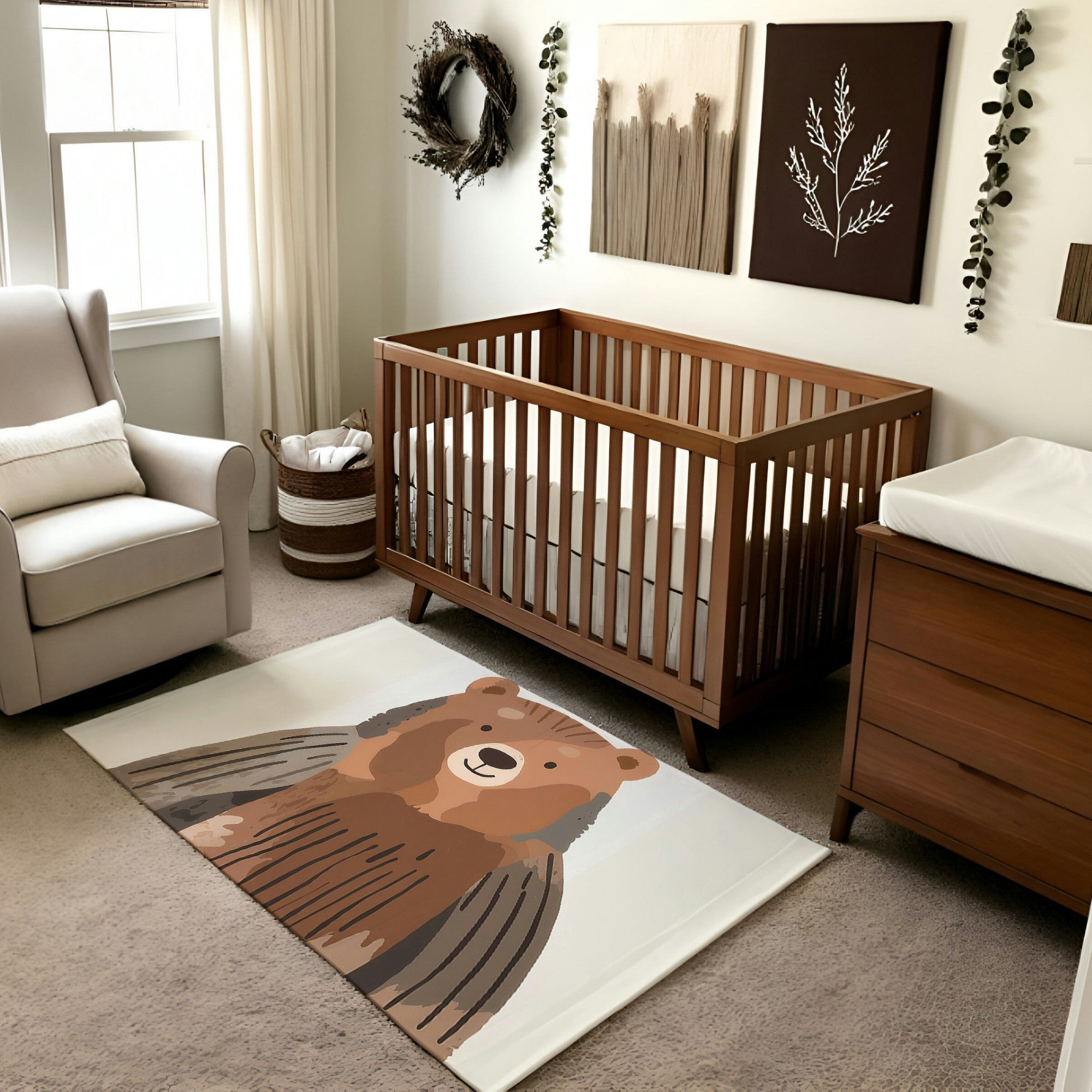 A nature-inspired nursery featuring a wooden crib, dresser, and cream armchair, accented with natural elements like a wreath and botanical artwork. The centerpiece rug showcases an illustration of a smiling brown bear, adding a playful yet calming woodland touch to the room's design.