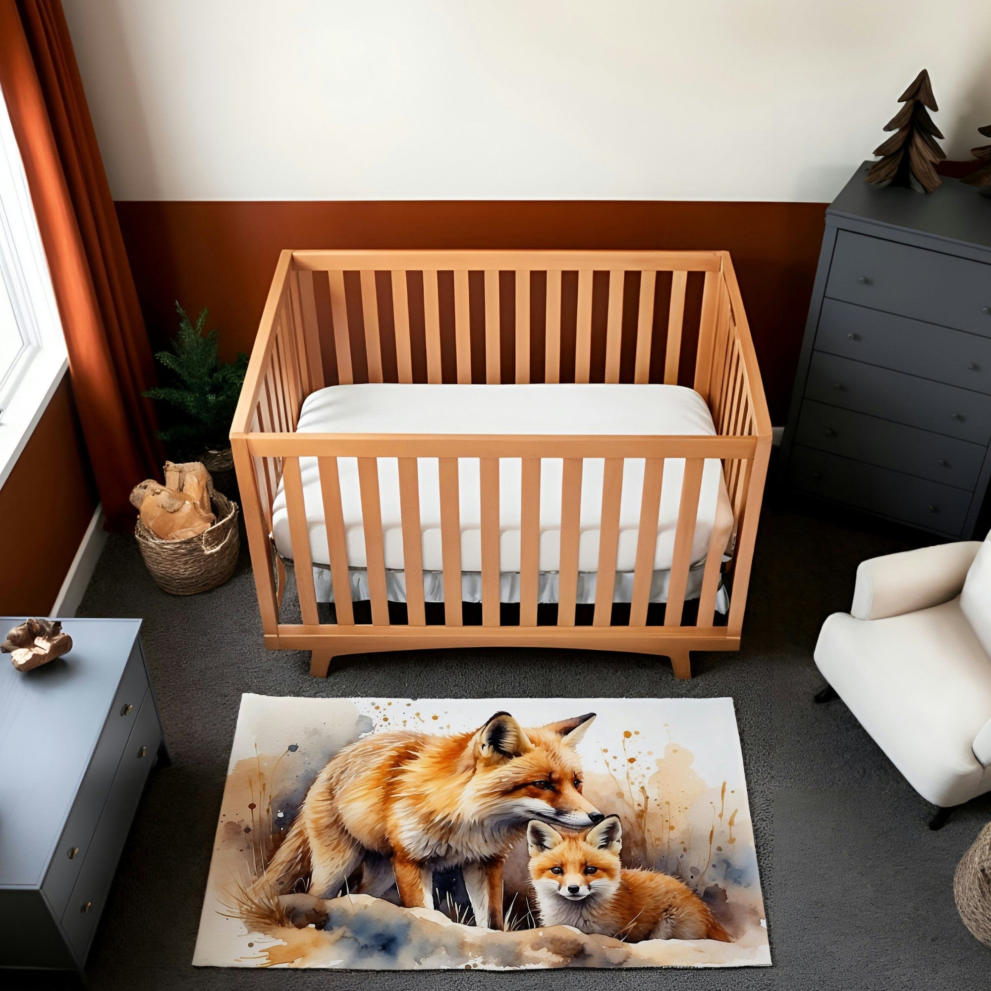 This nursery image showcases a cozy setup with a wooden crib, neutral-toned furniture, and an eye-catching rug featuring a watercolor-style illustration of a red fox and its cub. The rug’s artwork uses warm orange, beige, and soft gray tones, capturing a tender moment between the foxes in a natural setting. The overall decor combines earthy colors and nature-inspired elements for a calm and inviting atmosphere.