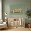 Whimsical mouse driving a baguette car wall art hanging above a light wood crib in a cozy nursery.