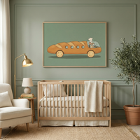Whimsical mouse driving a baguette car wall art hanging above a light wood crib in a cozy nursery.