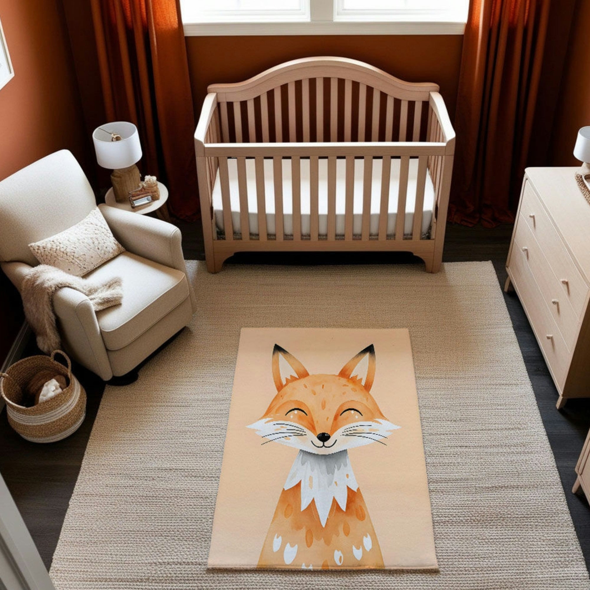 This nursery features a warm and inviting design with earthy orange tones and natural wood accents. A light wooden crib is paired with a neutral armchair, cozy knitted throw, and a matching wood dresser. The centerpiece is a playful rug featuring a smiling fox illustration in vibrant orange hues, blending seamlessly with the rust-colored curtains and soft beige rug. The overall look is cozy and nature-inspired, perfect for a woodland-themed space.