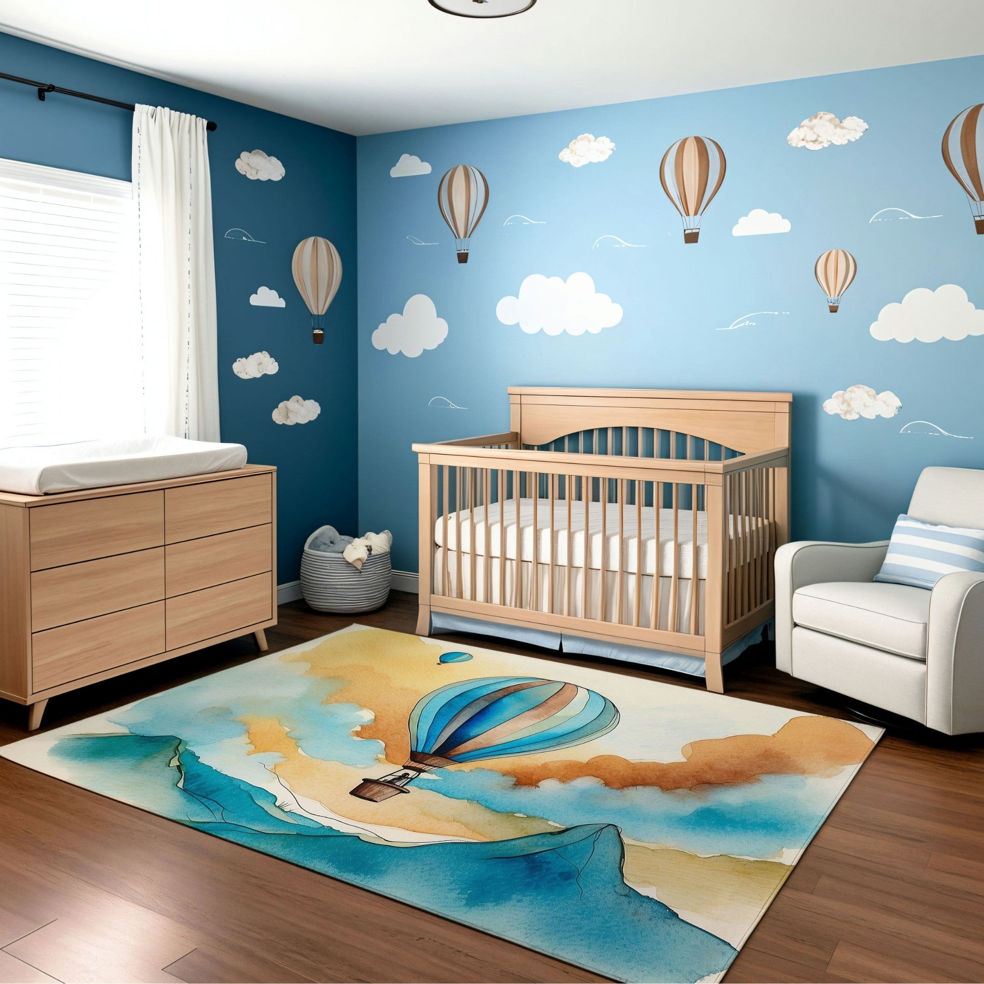 A bright and cheerful nursery featuring a wooden crib and a dresser, with walls painted sky blue and decorated with hot air balloon and cloud illustrations. The room includes a striped armchair and a colorful rug showing a watercolor-style design of a hot air balloon floating over mountain peaks under a vibrant, cloudy sky.