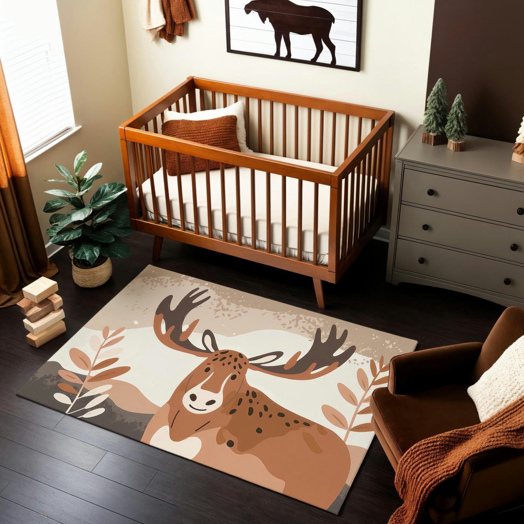 A cozy nursery with a wooden crib featuring a warm brown finish, complemented by an illustrated area rug showing a moose with large antlers surrounded by autumnal leaves. The room includes a dark wood dresser, small decorative trees, and earthy tones throughout, creating a rustic and inviting atmosphere.