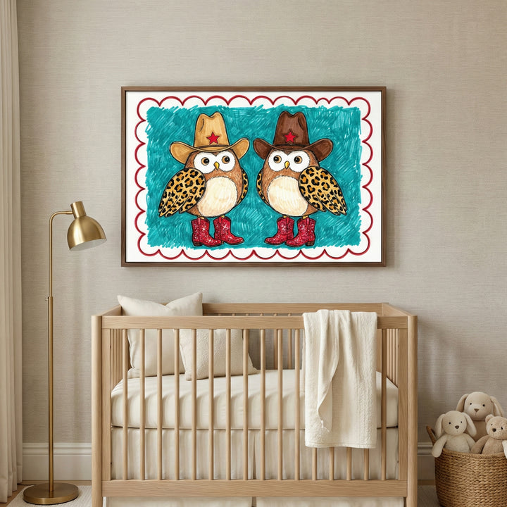 Playful western owl cowboy wall art hanging above a light wood crib in a minimalist nursery.
