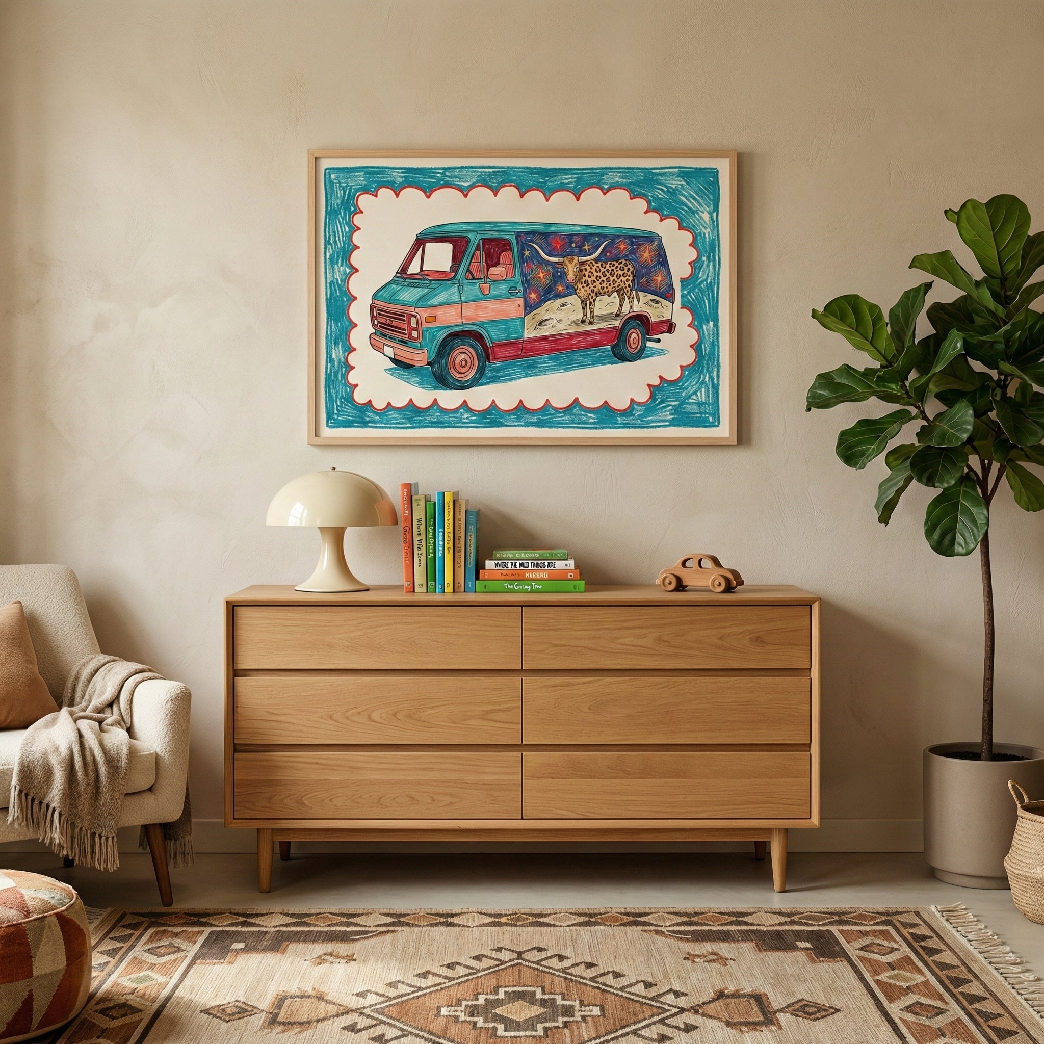 Interior shot of a cozy, modern living room with a framed artwork of a stylized van mural featuring a longhorn in space, hung above a light wood dresser decorated with books, a lamp, and a wooden toy car.
