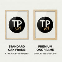 Side-by-side comparison of two oak wood frames featuring the “TP JOY” logo in a black circle. The left shows a standard 1/2 inch frame with kid-safe plexiglass, while the right displays a premium 3/4 inch frame with a real glass cover.