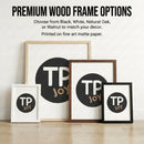 Four framed art prints leaning against a wall, each featuring the logo “TP JOY” in bold white and tan letters on a black circle, displayed in premium wood frames in white, natural oak, walnut, and black. Text above highlights the frame color options and mentions that prints are on fine art matte paper.