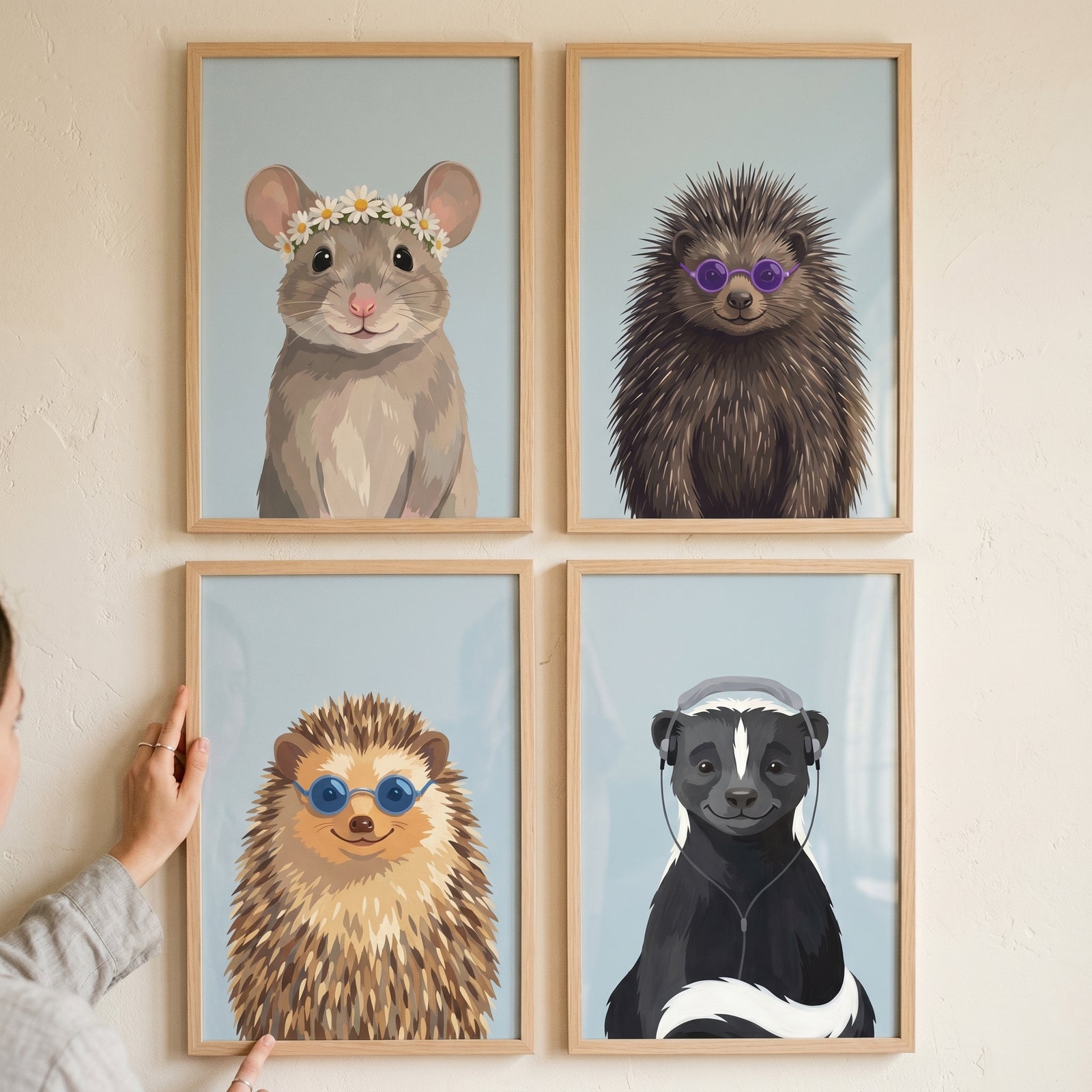 Hand hanging accessorized smiling woodland animal wall art set of 4 featuring a mouse, porcupine, hedgehog, and skunk.