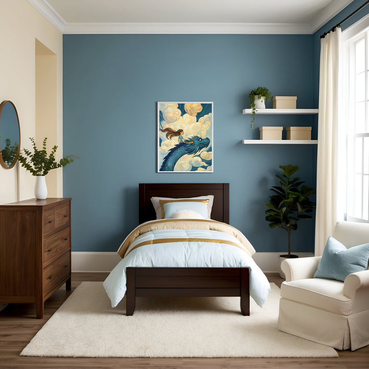 Soft and airy kid’s bedroom with blue walls, a dark wood bed dressed in pale blue and tan bedding, and a fluffy white rug. Above the bed hangs a framed illustration of a girl leaning forward on a flying blue dragon as they soar through swirling golden clouds.