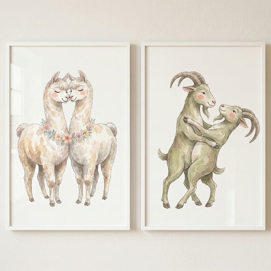 Affectionate farm animals wall art set of 2 featuring watercolor llamas and dancing goats in white frames.