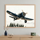 Child's bedroom with a light wood dresser against a gray wall. A large framed print featuring a dark blue propeller plane flying over pine trees and misty mountains hangs centered above the dresser.