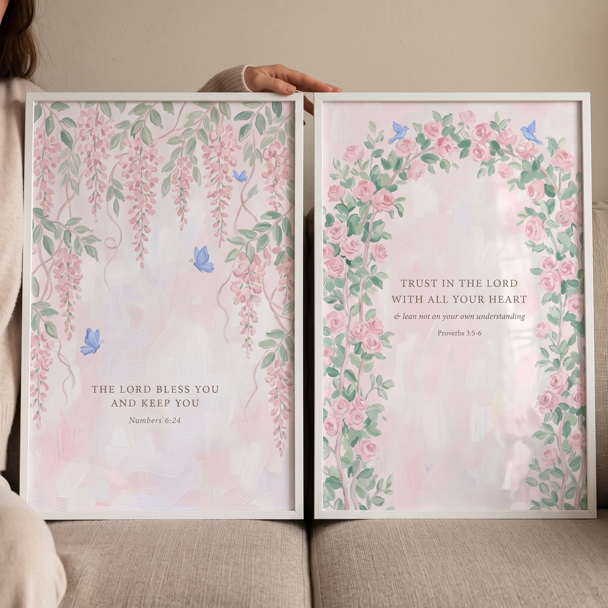 Airy watercolor floral scripture wall art set of 2 with pink blossoms, blue butterflies, and bible verses.