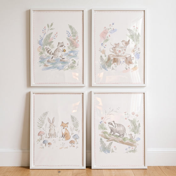 Watercolor antique nature forest animal wall art set of 4 featuring a raccoon, fox, rabbit, and badger in white frames.