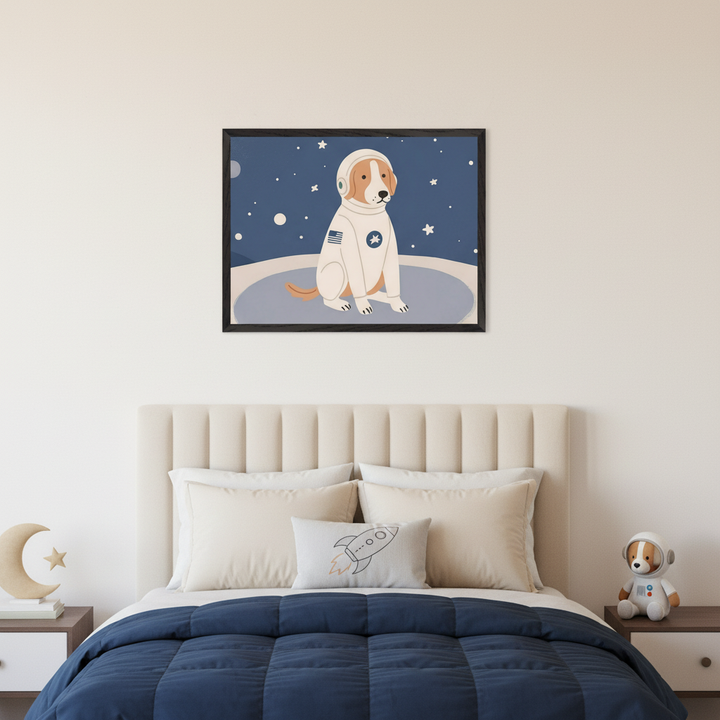 Kid's bedroom with a beige upholstered bed and two nightstands. A framed illustration of a dog in an astronaut suit on a starry planet hangs centered above the bed. The bed has a navy comforter and a rocket pillow.