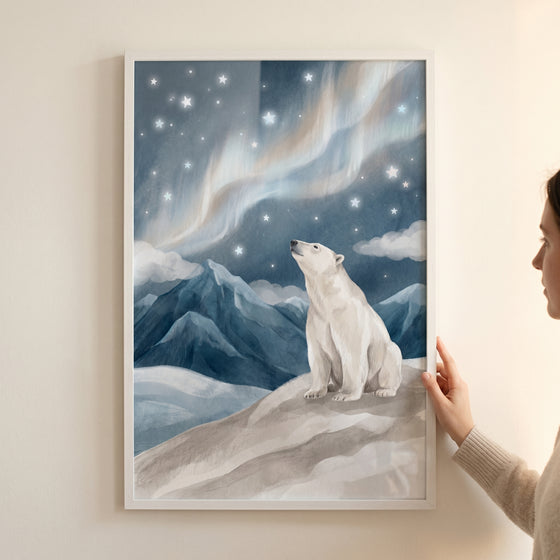 Framed aurora sky polar bear wall art features a bear gazing at stars and northern lights above snowy mountain peaks.