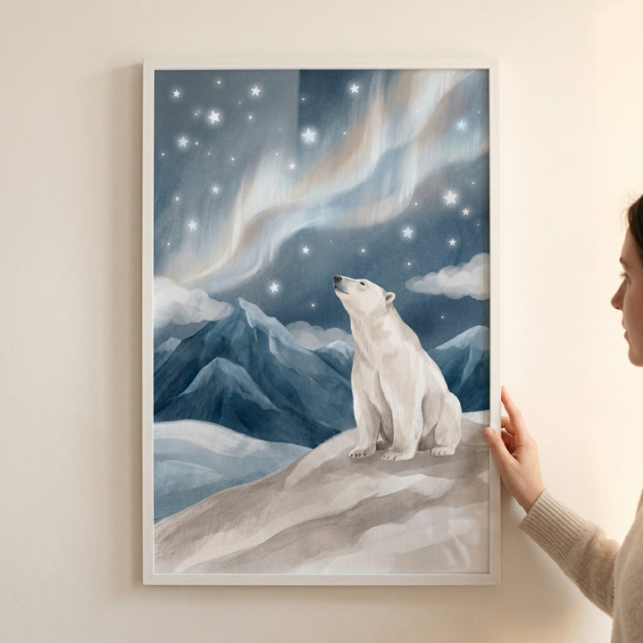 Framed aurora sky polar bear wall art features a bear gazing at stars and northern lights above snowy mountain peaks.