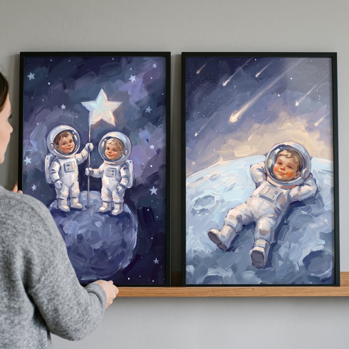 Azure moonlit baby astronaut wall art set of 2 depicts infants in spacesuits exploring celestial bodies and stars.