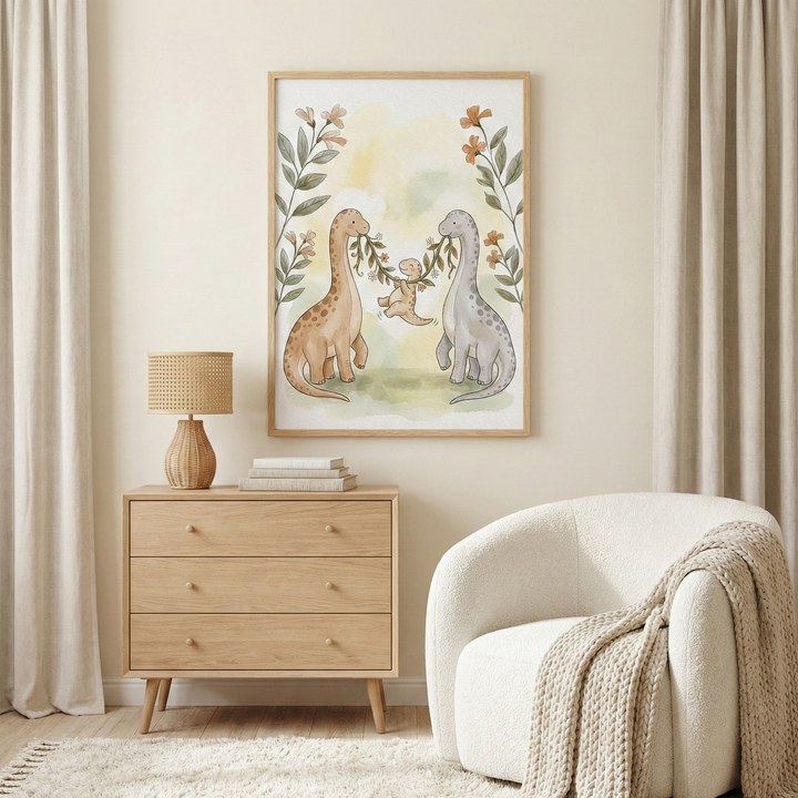 A framed watercolor-style illustration of three cartoon dinosaurs hangs in a serene nursery. Two large long-necked dinosaurs hold a leafy vine, with a small baby dinosaur suspended in the middle. The art features muted earth tones and floral accents. Below sits a light wood three-drawer dresser with a textured lamp. To the right, a rounded white armchair is draped with a chunky cream-colored knit blanket. Neutral curtains and a soft rug complete the warm, minimal room decor.