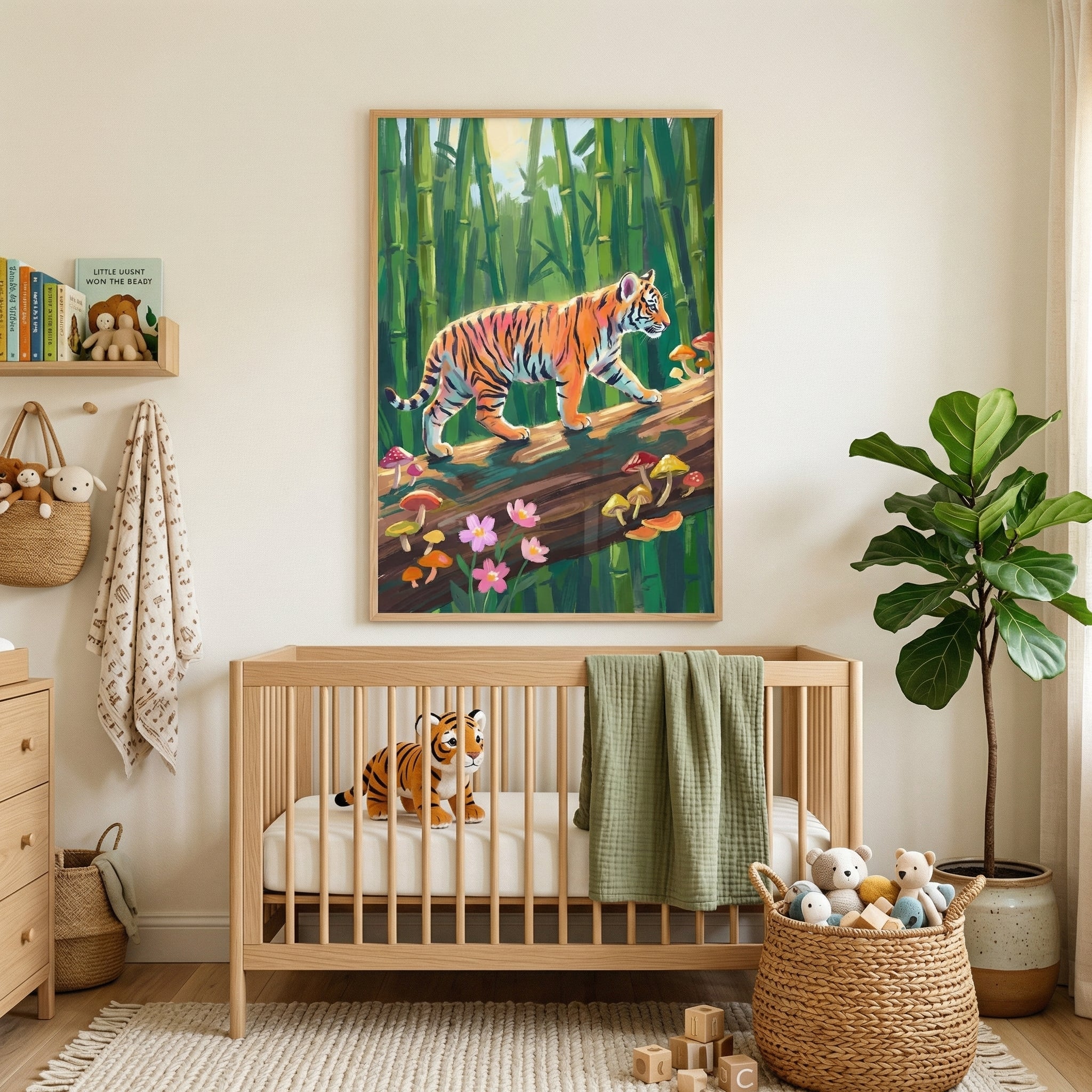 A cozy and bright child's nursery features light-colored walls and warm wooden accents. Centered on the wall is a large framed illustration showing a vibrant tiger walking across a fallen log in a lush green bamboo forest. Colorful mushrooms and pink flowers sprout from the base of the log. 
