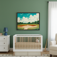 Modern nursery with a white crib and dresser. A large framed painting of a baseball field under a cloudy sky hangs centered on the green wall above the crib.