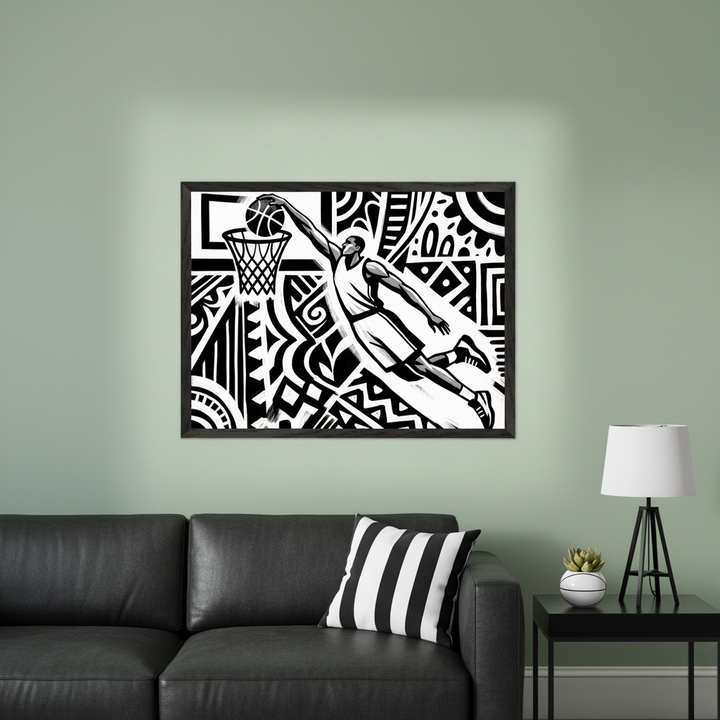 Modern living room featuring a large framed black and white graphic art print of a basketball player dunking with abstract patterns, hung above a black leather sofa. A black side table with a lamp and small plant sits to the right.