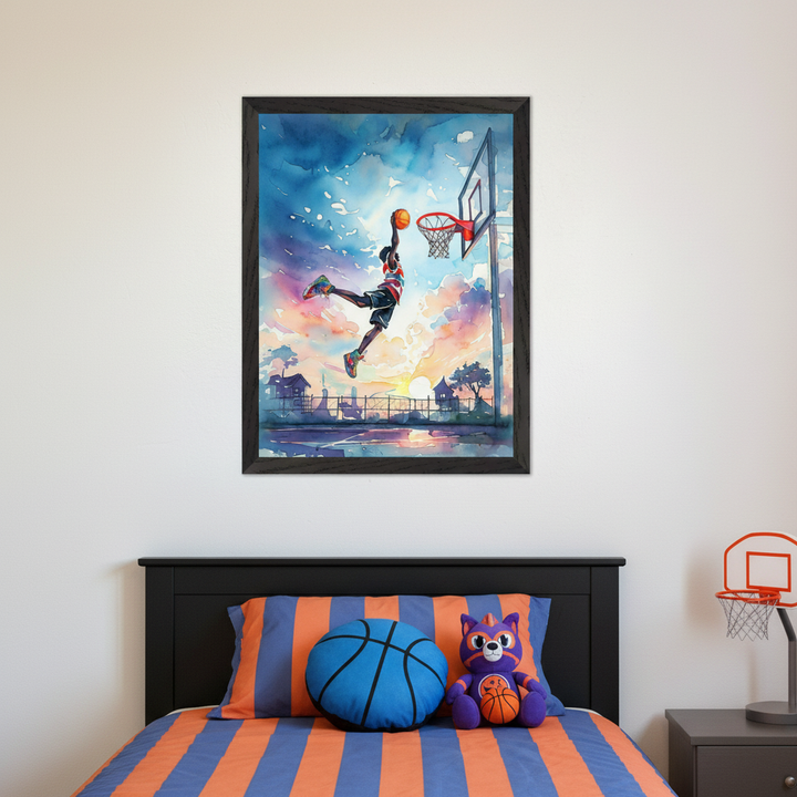 Kid's bedroom with a black bed and orange/blue striped bedding. Centered above the bed hangs a framed watercolor painting of a basketball player mid-dunk against a vibrant sunset sky. A basketball pillow and cat plush are on the bed, with a mini hoop on a nightstand.