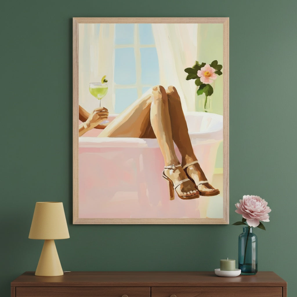 Modern room with a wooden dresser. A large framed painting hangs centered above the dresser, depicting a person's legs and arm in a pink bathtub holding a cocktail, with one leg out wearing a high-heeled sandal, in a painterly style. 