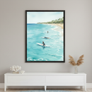 Framed beach-themed artwork featuring three surfers paddling on turquoise water near a tropical shoreline lined with palm trees. The calm sea and clear skies create a peaceful, laid-back atmosphere, capturing the essence of a sunny day at the coast.