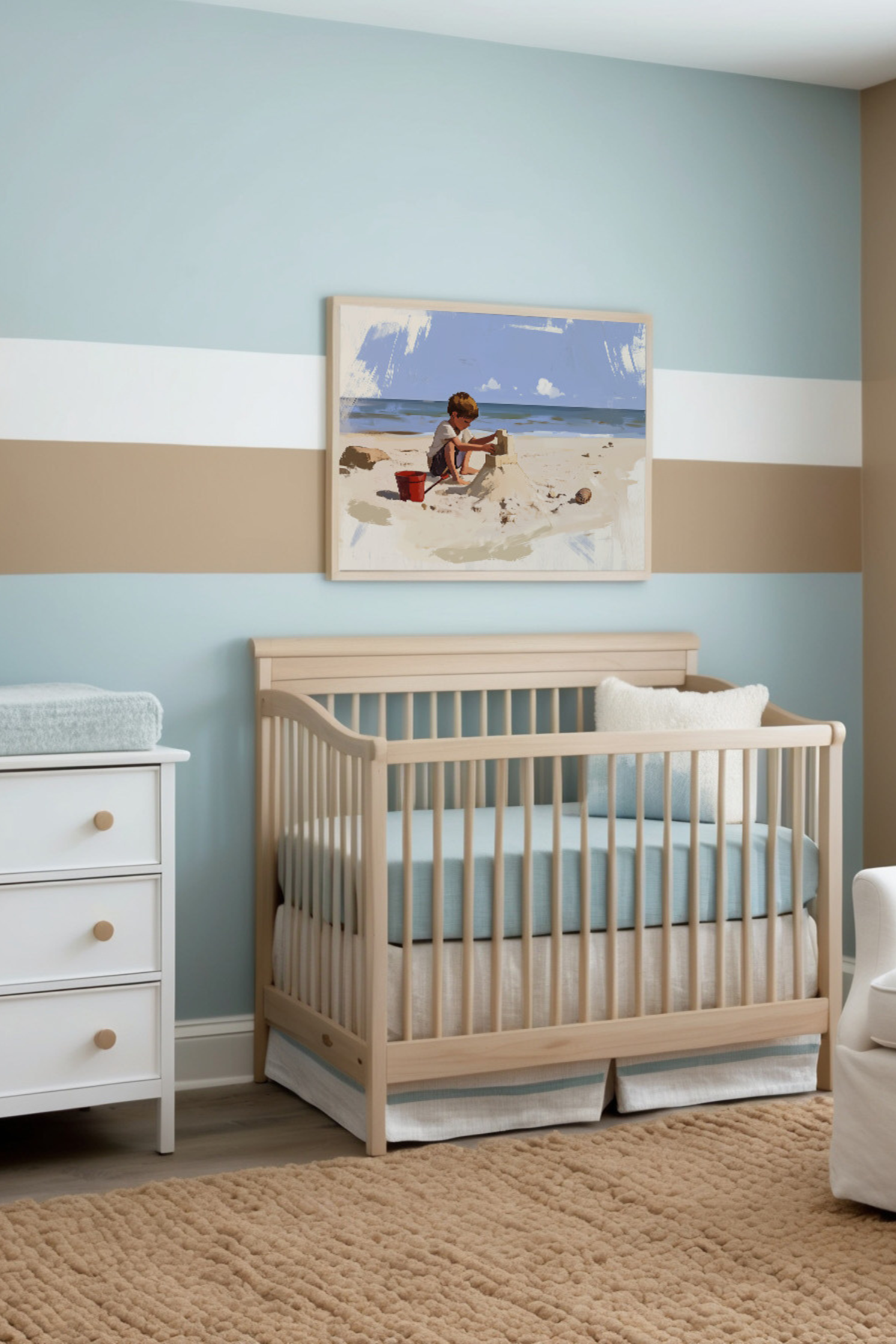 Bright and airy nursery decorated with beachy blues, sand-colored accents, and natural wooden furniture, including a cozy crib. A playful painting of a child building a sandcastle hangs above the crib, bringing a cheerful coastal feel to the space.