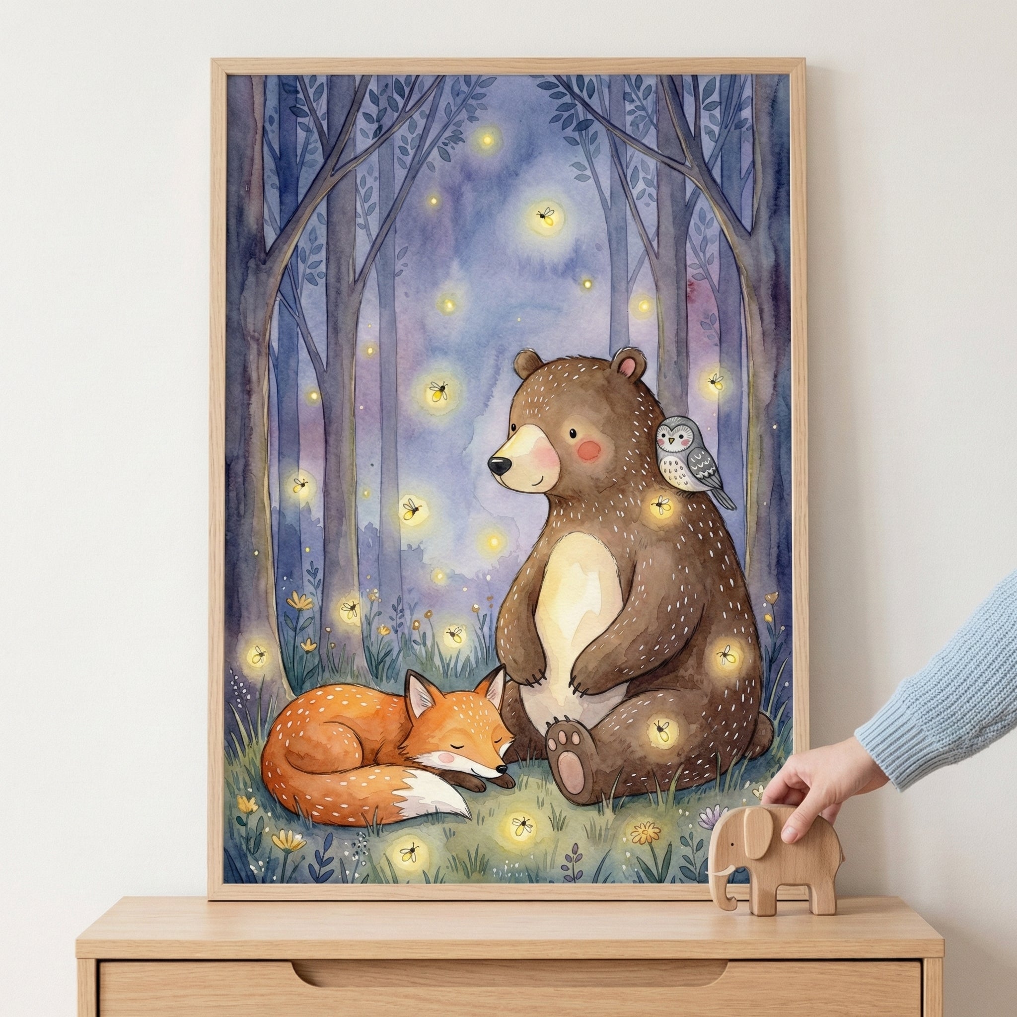 Watercolor illustration of a bear sitting peacefully with a sleeping fox at its side and an owl perched on its shoulder, surrounded by glowing fireflies in a dreamy purple forest. The scene radiates calm and nighttime magic.