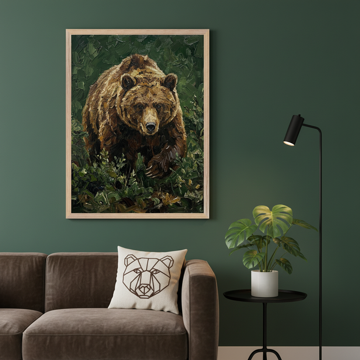 Modern living room with a brown sofa against a dark green wall. A large framed oil painting of a brown grizzly bear in green foliage hangs above the sofa. A geometric bear pillow, a black floor lamp, and a Monstera plant on a side table are also visible.