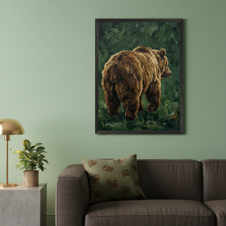 Modern living room with a brown leather sofa and a concrete side table. A framed oil painting of a brown bear walking away in green foliage hangs above the right side of the sofa.