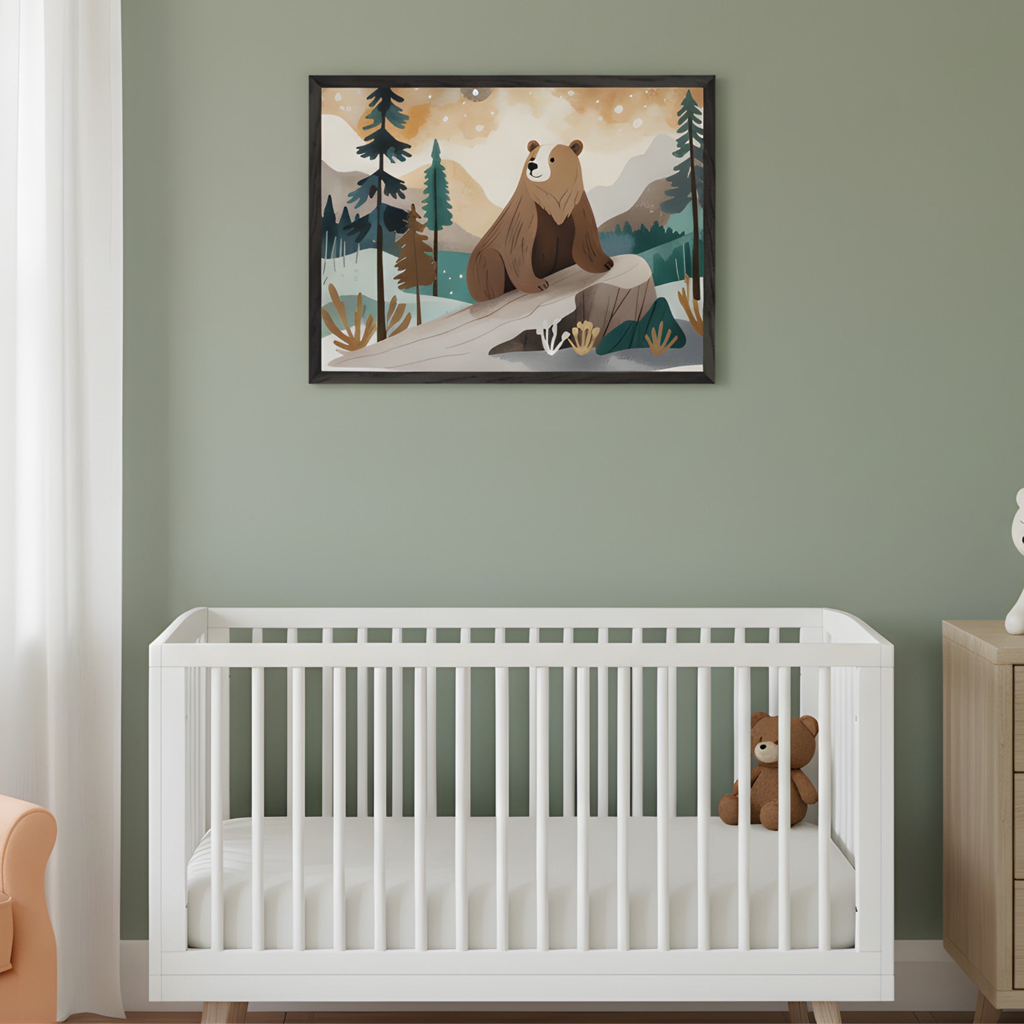 Modern nursery with a white crib, wooden dresser, and peach armchair. A framed illustration of two brown bears on a log in a forest scene hangs on the green wall above the crib.