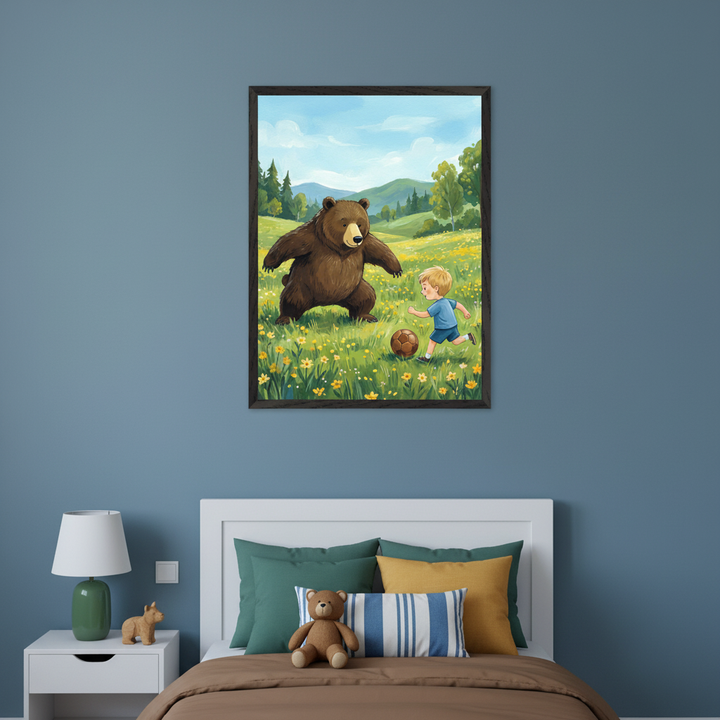 Kid's bedroom with a white bed and nightstand against a blue wall. A framed cartoon-style illustration of a large bear and a small boy playing soccer in a flowery field hangs centered above the bed.
